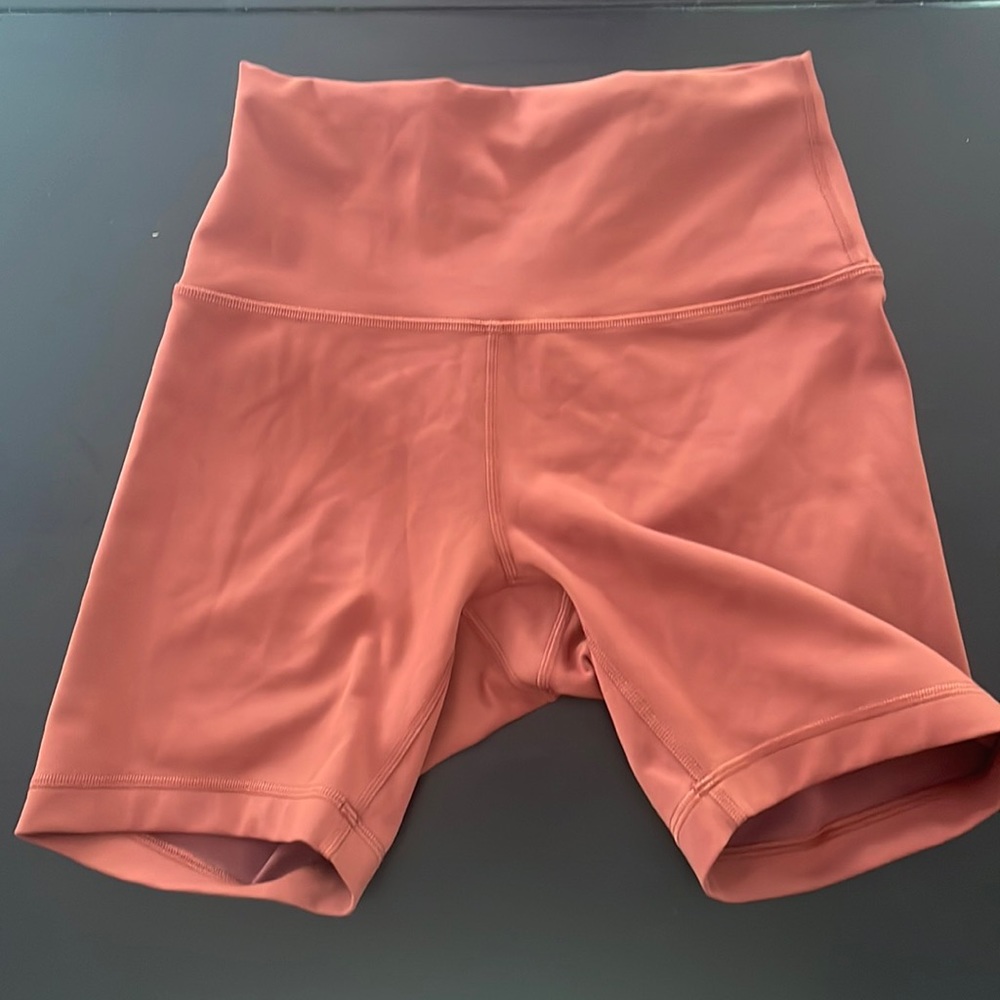 Women's Wunder Train high rise 6” shorts.